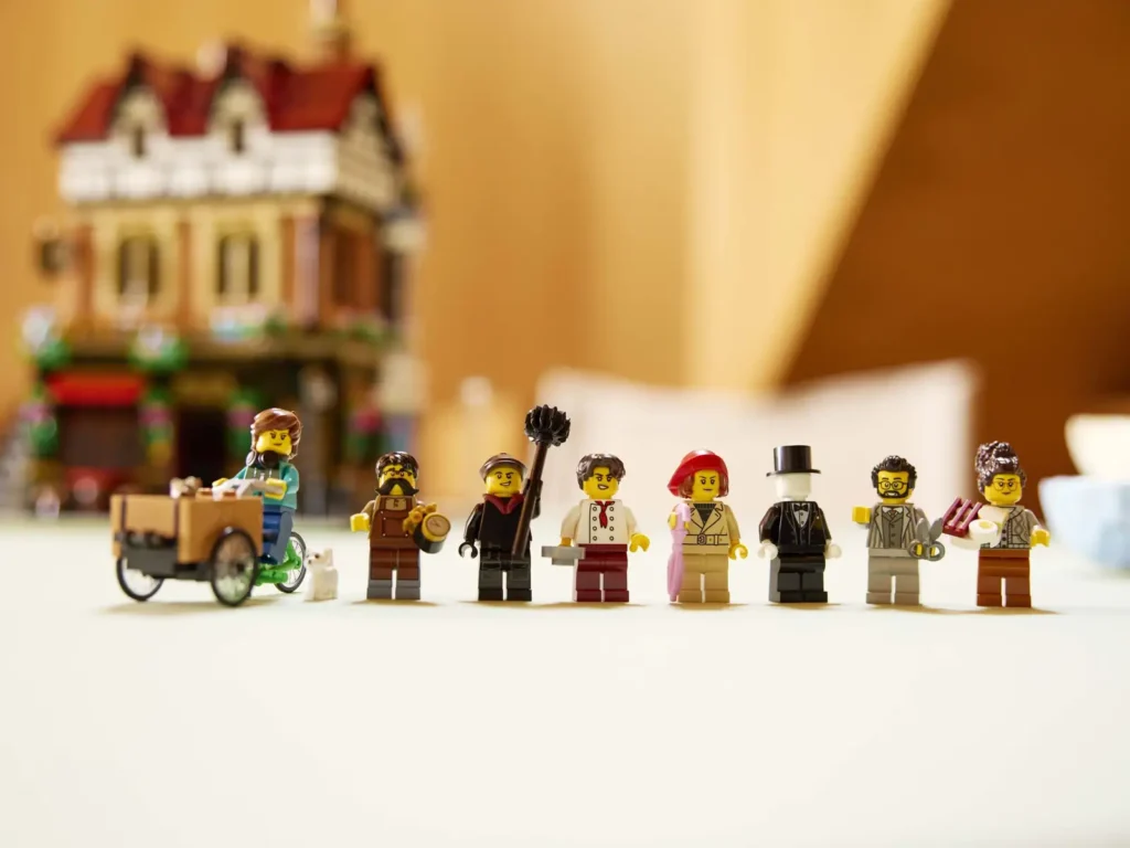Minifigúrky šéfkuchára, kominára, majiteľky reštaurácie, hodinára, obyvateľa budovy, zákazníka, krajčíra galantérie a manekína